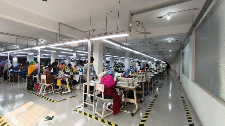 Workers sewing garments in production lines – M&A Sourcing Ltd.